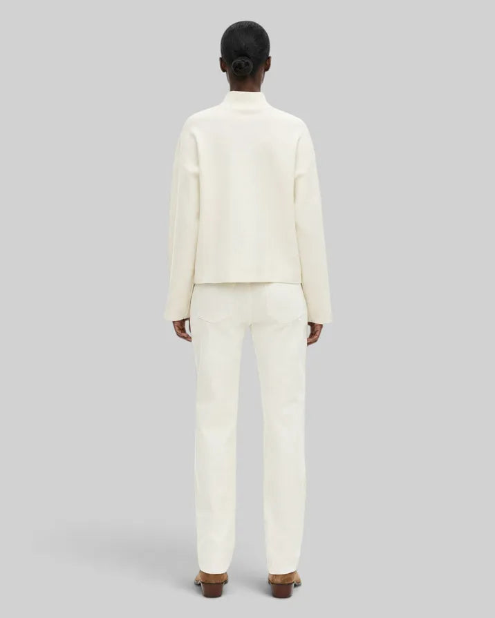 White mock-neck sweater