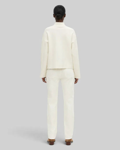 White mock-neck sweater