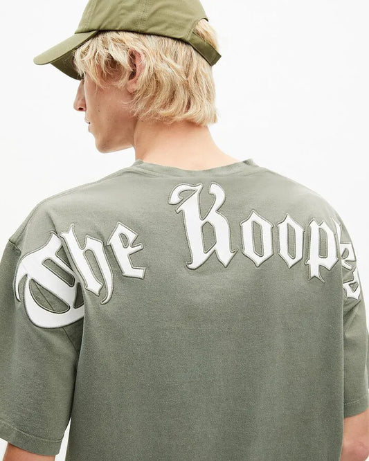 T-shirt with green logo on back