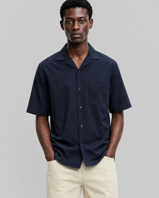 Solid navy blue short-sleeved shirt