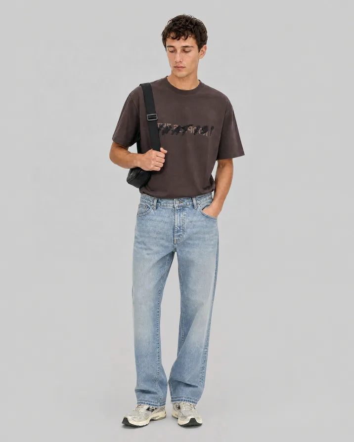 Light blue straight-leg jeans with raw-edge hems