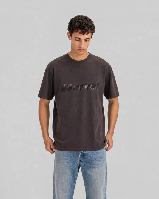 What is brown denim patch t-shirt